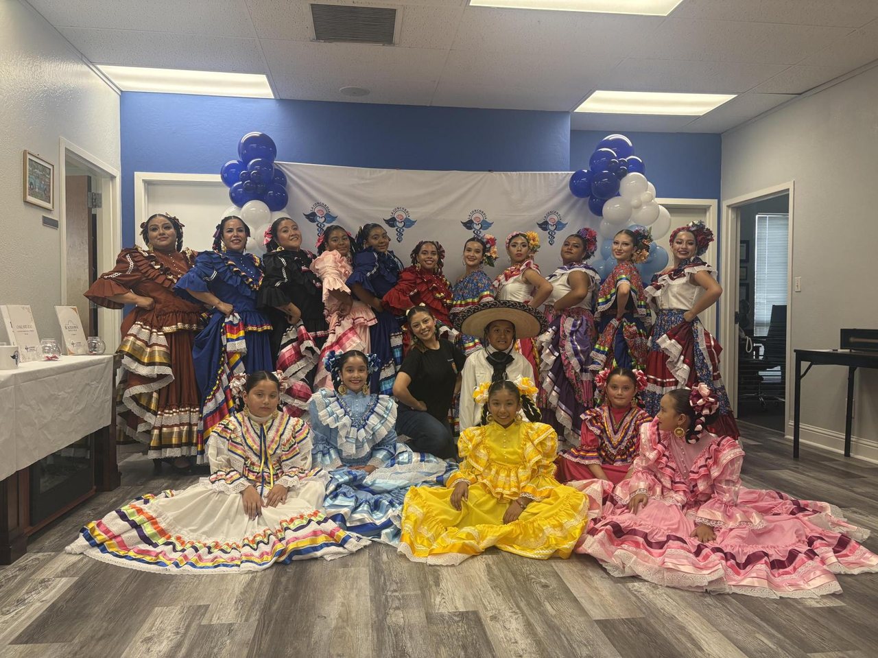 Ballet folklorico dancers in colorful traditional dresses at the La Concordia celebration