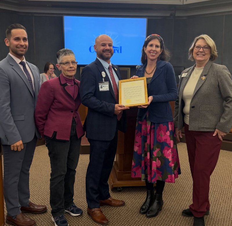La Concordia receiving a proclamation from the Concord City Council